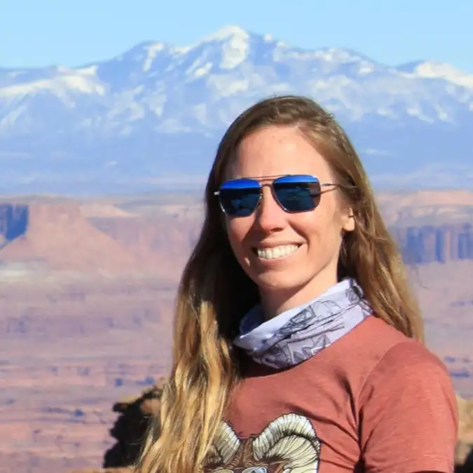 Ashley Tepen, digital marketing director and slow-travel planner, on a canyon overlook in Utah